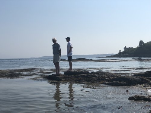 Dr. Branton and his son enjoying the Maine coast.