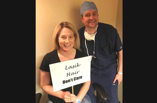 Dr. Jeffrey Lusk with a patient after LASIK