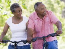 couple senior biking at at Lusk Eye Specialists in Shreveport