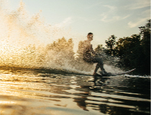 man surfing in the lake  at Lusk Eye Specialists in Shreveport